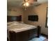 Comfortable bedroom with updated decor, a bed, a ceiling fan and windows, creating a welcoming space at 170 Beatrice St, Dallas, GA 30157