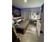 Bedroom featuring a sofa, vanity, and sleek flooring at 170 Beatrice St, Dallas, GA 30157