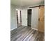 Bedroom with sliding barn door and closet space at 170 Beatrice St, Dallas, GA 30157