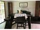 Breakfast nook with built-in seating and table with patio access offers great flow at 170 Beatrice St, Dallas, GA 30157