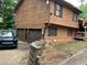 Charming split-level home with wood siding, two-car garage, and a partially finished block foundation at 170 Beatrice St, Dallas, GA 30157