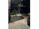 Retaining wall with manicured landscaping at dusk, creating a peaceful ambiance at 170 Beatrice St, Dallas, GA 30157