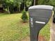 Mailbox with house number and a view of the lawn and treed area at 170 Beatrice St, Dallas, GA 30157