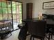 Outdoor patio with built-in seating, adjacent to a kitchen and dining area, offers a great view of nature at 170 Beatrice St, Dallas, GA 30157