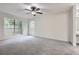 Bright bedroom with large windows and plush carpeting at 2901 Lenox Rd # 702, Atlanta, GA 30324