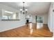 Bright open-concept living area featuring hardwood floors and natural light at 2901 Lenox Rd # 702, Atlanta, GA 30324