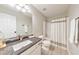 Bathroom with granite countertops, a shower with a curtain, and modern fixtures at 3816 Harris Nw Blvd, Kennesaw, GA 30144