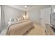 Bedroom featuring a queen bed, modern decor, and carpet flooring at 3816 Harris Nw Blvd, Kennesaw, GA 30144