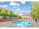 Beautiful community pool and clubhouse framed by vibrant greenery, creating a resort-like atmosphere at 3816 Harris Nw Blvd, Kennesaw, GA 30144
