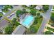 Aerial view of the community pool, deck chairs, and mature trees in Legacy Park at 3816 Harris Nw Blvd, Kennesaw, GA 30144