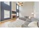 Bright living room with a soaring ceiling, a brick fireplace, and a large gray sectional sofa at 3816 Harris Nw Blvd, Kennesaw, GA 30144