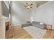 Bright living room boasts a fireplace, high ceilings, a ceiling fan, and ample seating at 3816 Harris Nw Blvd, Kennesaw, GA 30144