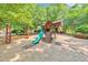 A playground with a slide, climbing wall, and monkey bars in the Legacy Park community at 3816 Harris Nw Blvd, Kennesaw, GA 30144