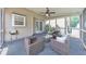 Relaxing screened-in porch with comfortable seating, perfect for enjoying the outdoors at 3816 Harris Nw Blvd, Kennesaw, GA 30144
