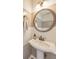 Cozy powder room features a pedestal sink, modern fixtures, and neutral paint at 3816 Harris Nw Blvd, Kennesaw, GA 30144