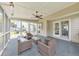 Enjoy the outdoors on this carpeted screened porch with furniture and easy access to the backyard at 3816 Harris Nw Blvd, Kennesaw, GA 30144