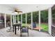 View from screened-in porch to fenced in backyard with trampoline at 4274 Timber Trace Road, Loganville, GA 30052