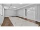 Large finished basement with an open layout and neutral paint at 1897 Alcovy Trace Way Way, Lawrenceville, GA 30045