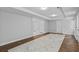 Spacious finished basement with multiple entry points and new flooring throughout the space at 1897 Alcovy Trace Way Way, Lawrenceville, GA 30045