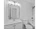 A bathroom showcasing a vanity, a mirror with modern lighting, and a shower/tub combo at 1897 Alcovy Trace Way Way, Lawrenceville, GA 30045