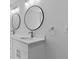 Bathroom vanity featuring double sinks, sleek round mirrors, and white cabinetry at 1897 Alcovy Trace Way Way, Lawrenceville, GA 30045