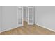 Cozy room with hardwood floors and simple decor, featuring an open doorway at 1897 Alcovy Trace Way Way, Lawrenceville, GA 30045
