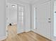 Inviting foyer with hardwood flooring, complemented by a view into an adjacent office space at 1897 Alcovy Trace Way Way, Lawrenceville, GA 30045