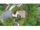 Aerial shot of the property showcasing the driveway and surrounding trees at 2701 Windsor Nw Ct, Kennesaw, GA 30144