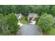 Aerial view of the home nestled on a cul-de-sac surrounded by lush greenery at 2701 Windsor Nw Ct, Kennesaw, GA 30144