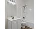 This full bathroom offers a shower-tub combo and a sink with a vanity at 2701 Windsor Nw Ct, Kennesaw, GA 30144