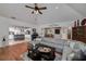 Spacious living room with an open concept and hardwood floors at 2825 Lake Ct, Cumming, GA 30041