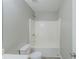 Cozy bathroom features a white toilet, tub and shower with neutral paint, creating a clean and functional space at 7250 Old Chapel, Atlanta, GA 30349