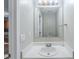 Powder room features white vanity, modern lighting, and updated fixtures at 7250 Old Chapel, Atlanta, GA 30349