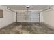 Empty two car garage featuring light walls and a concrete floor at 7250 Old Chapel, Atlanta, GA 30349