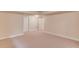 Spacious finished basement with neutral walls and carpet at 764 Morganton Dr, Johns Creek, GA 30024
