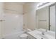 Clean bathroom with bathtub and shower combo, toilet, and sink, providing a fresh and functional space at 764 Morganton Dr, Johns Creek, GA 30024