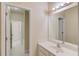 Bathroom with white vanity, mirror, and tile floors at 764 Morganton Dr, Johns Creek, GA 30024