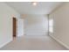 Neutral bedroom with open doorway and ample natural light at 764 Morganton Dr, Johns Creek, GA 30024