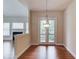 Bright dining area with hardwood floors and access to an outdoor space at 764 Morganton Dr, Johns Creek, GA 30024