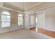 Formal dining room featuring tray ceilings and classic decor at 764 Morganton Dr, Johns Creek, GA 30024