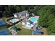 Overhead view displaying the community clubhouse, pools, playground, and tennis courts at 100 Pine Mist Cir, Alpharetta, GA 30022