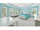 Bright bedroom featuring tray ceiling, large windows, and white trim at 100 Pine Mist Cir, Alpharetta, GA 30022