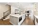 Bright kitchen features a large island and stainless steel appliances, perfect for cooking at 100 Pine Mist Cir, Alpharetta, GA 30022
