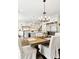 Modern kitchen with stainless steel appliances, a large island, and a breakfast nook at 100 Pine Mist Cir, Alpharetta, GA 30022