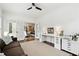 Bright home office featuring a large desk area, and lots of natural light at 100 Pine Mist Cir, Alpharetta, GA 30022