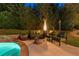 The pool area has stone accents and provides an outdoor seating area and gas heat lamp at 100 Pine Mist Cir, Alpharetta, GA 30022