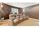 Home theater features tiered seating with leather recliners and sconce lighting at 100 Pine Mist Cir, Alpharetta, GA 30022