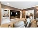 Home theater features built in shelving, large screen television and comfortable seating at 100 Pine Mist Cir, Alpharetta, GA 30022