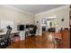 Spacious office featuring hardwood floors, large desk area and fireplace at 1019 Legacy Walk, Woodstock, GA 30189