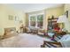 Bedroom with a large window, neutral carpet, and yellow walls at 2505 Northlake Court Northeast, Atlanta, GA 30345